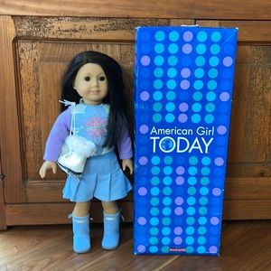 American girl doll. Ice skates, boots, various outfits